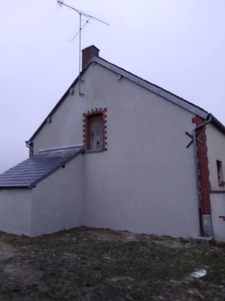 Pignon après ravalement, enduit refait
